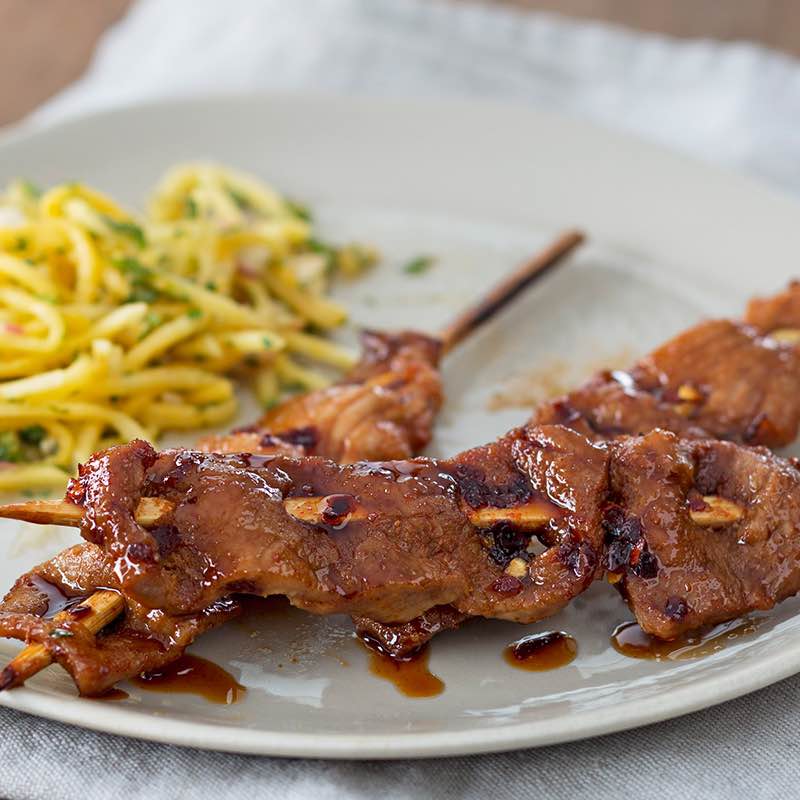 gegrilltes Pinoy-Schwein mit grünem Mangosalat